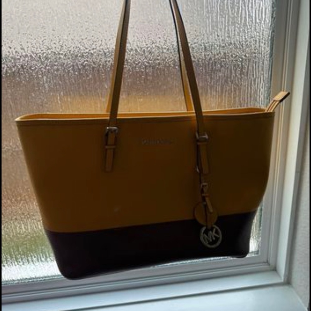 Yellow and brown MK tote bag